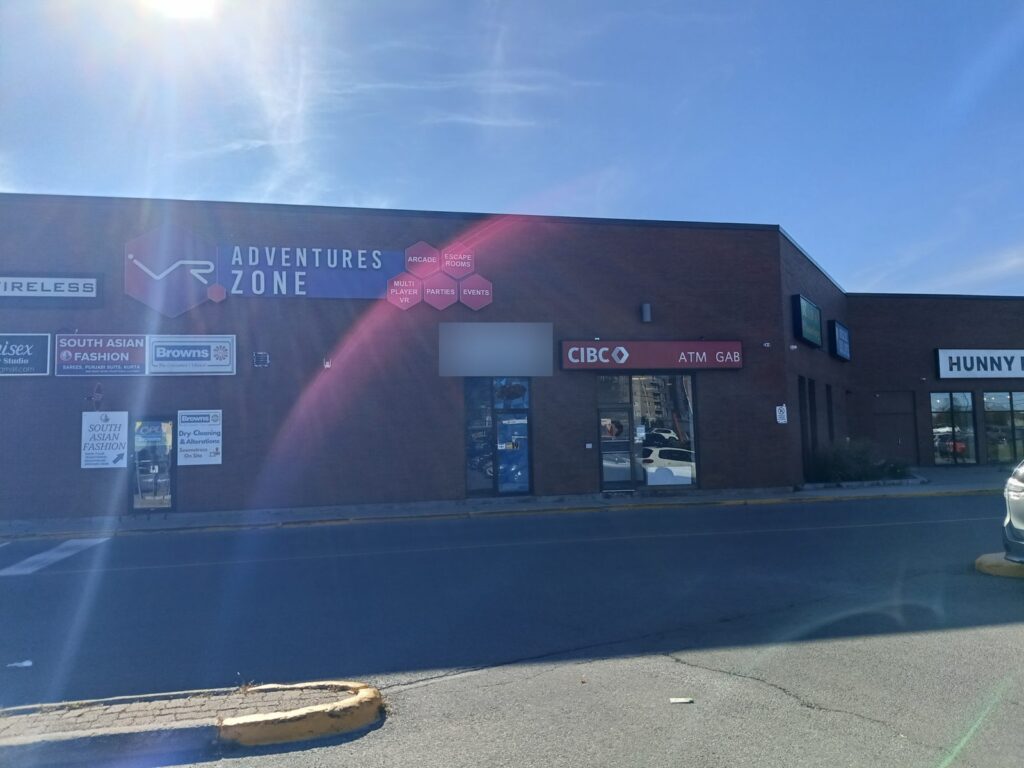 Exterior of Merivale Mall at 1642 Merivale Road, Ottawa, showing the retail unit beside CIBC