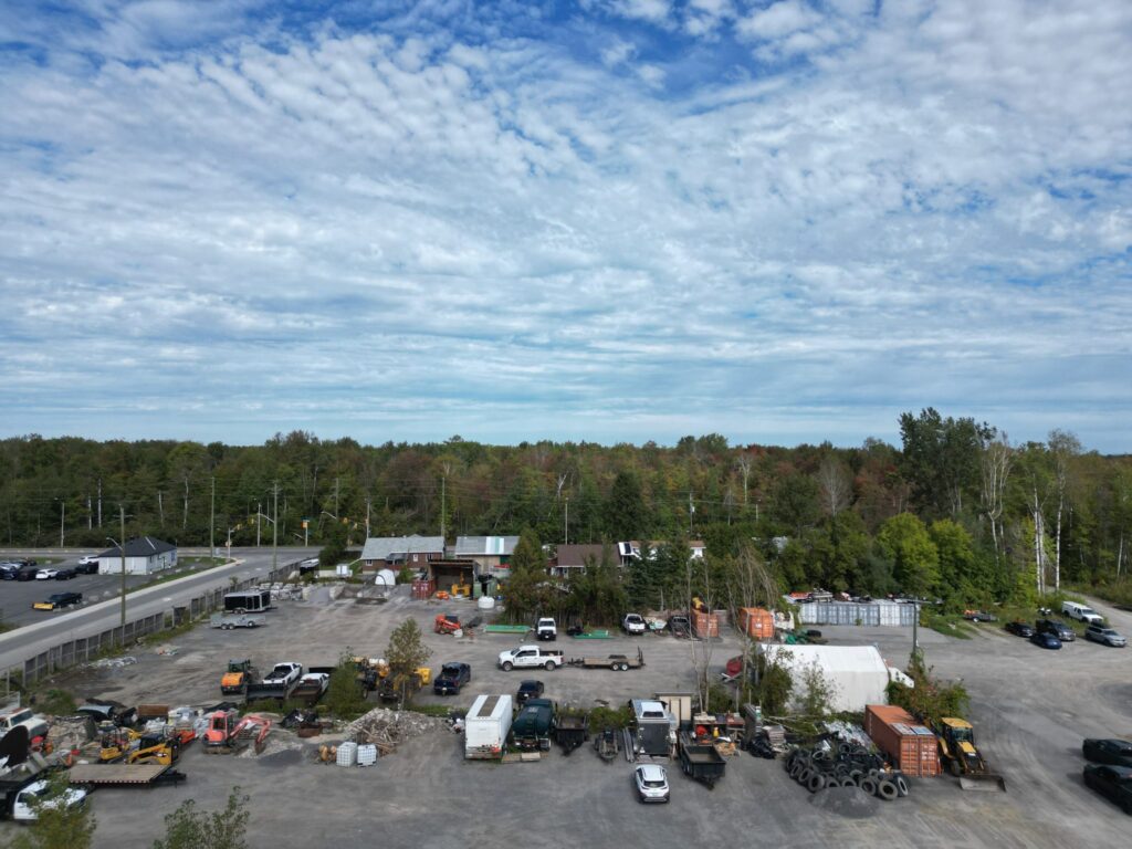 Equipment and vehicle storage in the large yard at 2538 Leitrim Road